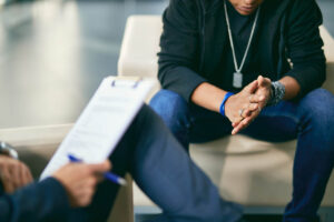 Man learning about psychotherapy vs. counseling