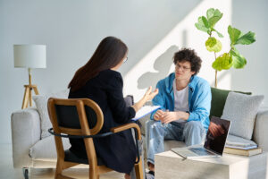 Man sitting on couch in counseling session