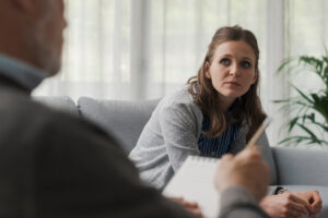 Woman listening to counselor