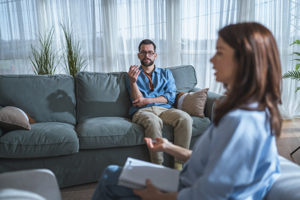 Man sitting in psychiatrist's office