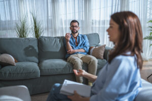 Man sitting in psychiatrist's office